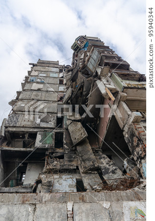destroyed and burned houses in the city during the war in Ukraine destroyed and burned houses in the city during the war in Ukraine 95940344