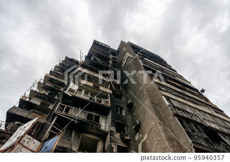 destroyed and burned houses in the city during the war in Ukraine destroyed and burned houses in the city during the war in Ukraine 95940357