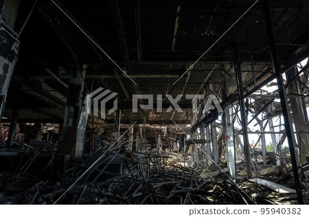 destroyed and burned houses in the city during the war in Ukraine 95940382