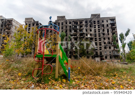 destroyed and burned houses in the city during the war in Ukraine destroyed and burned houses in the city during the war in Ukraine 95940420