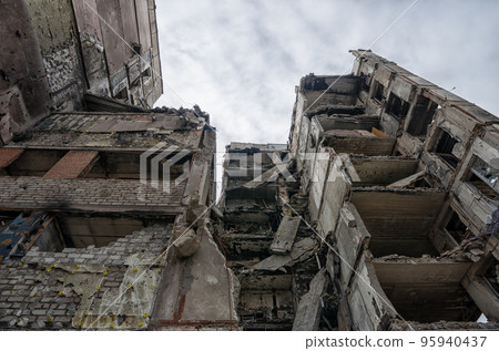 destroyed and burned houses in the city during the war in Ukraine destroyed and burned houses in the city during the war in Ukraine 95940437