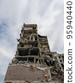destroyed and burned houses in the city during the war in Ukraine 95940440