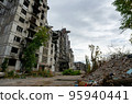 destroyed and burned houses in the city during the war in Ukraine 95940441