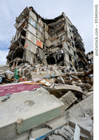 destroyed and burned houses in the city during the war in Ukraine destroyed and burned houses in the city during the war in Ukraine 95940448