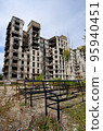 destroyed and burned houses in the city during the war in Ukraine 95940451