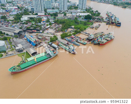 Aerial view of Bangkok City skyline by Chao Phraya River in Thailand. Financial district and skyscraper office buildings. Downtown skyline. Urban town. 95941322