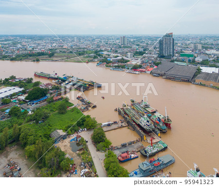 Aerial view of Bangkok City skyline by Chao Phraya River in Thailand. Financial district and skyscraper office buildings. Downtown skyline. Urban town. 95941323