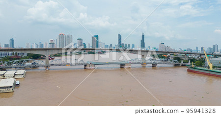 Aerial view of Bangkok City skyline by Chao Phraya River in Thailand. Financial district and skyscraper office buildings. Downtown skyline. Urban town. 95941328