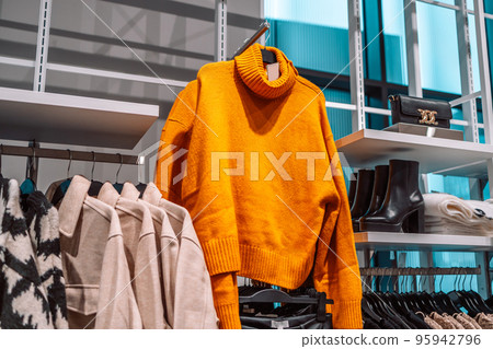 Autumn winter collection in a clothing store, Shopping store. Gdansk, Poland, Europe. Autumn winter collection in a clothing store, Shopping store. Gdansk, Poland, Europe. 95942796