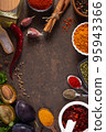 Variety of spices and herbs at table background. Cooking concept and ingredients on table 95943366