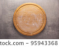 Pizza board on stone background top table. Wooden cutting board 95943368