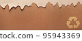 Cardboard torn edge and recycle symbol on paper background texture. Brown ripped paper 95943369