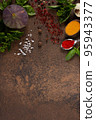 Variety of spices and herbs at table background. Cooking concept and ingredients 95943377