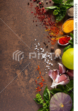 Variety of spices and herbs at table background. Cooking concept and ingredients 95943379