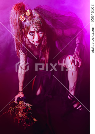 Tragic bride zombie girl who is too beautiful in Halloween costume Tragic bride zombie girl who is too beautiful in Halloween costume 95946108