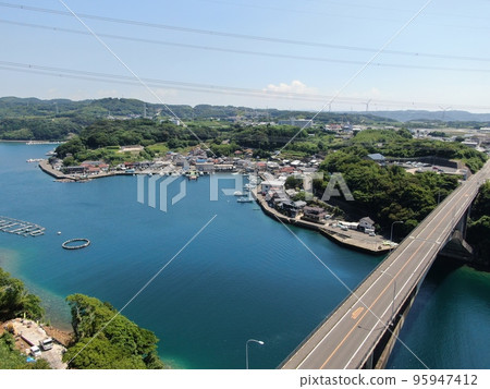 Aerial view of Sototsu Ohashi Bridge over the beautiful sea of Sototsuura Aerial view of Sototsu Ohashi Bridge over the beautiful sea of Sototsuura 95947412