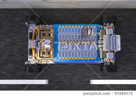 Electric car with pack of battery cells on road Electric car with pack of battery cells on road 95948575