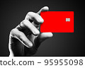 Man's hand holding credit card. 95955098