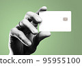 Man's hand holding credit card. 95955100