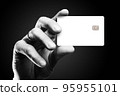 Man's hand holding credit card. 95955101