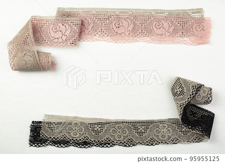 Lace on natural linen fabric. 95955125