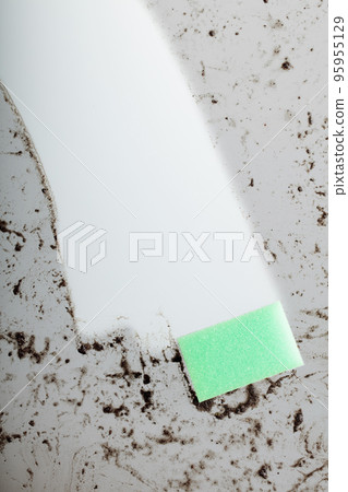 Dirty glass and a sponge . Dirty glass and a sponge . 95955129