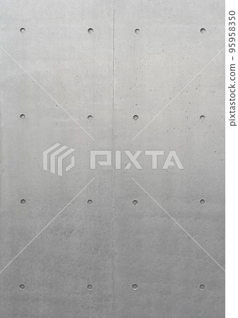 Vertical background image of a light gray concrete wall lined with sepah holes 95958350