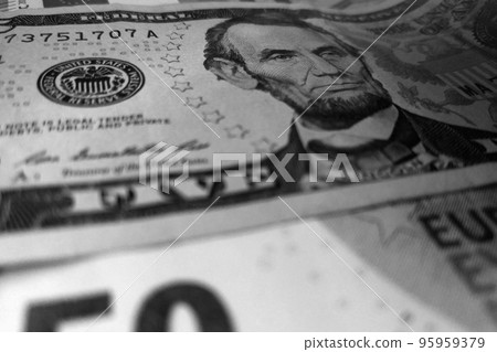 Black and white photo, Banknotes of dollars and euros. Economy concept. Development and decline. Economic crisis. 95959379