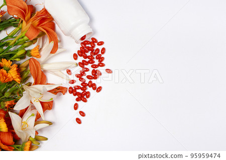 Banner with bioadditive tablets and medicinal plants with place for text copy space. Lutein, herbal medicine pills Banner with bioadditive tablets and medicinal plants with place for text copy space. Lutein, herbal medicine pills 95959474