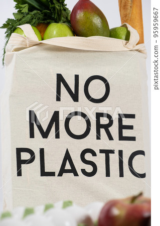 Reusable fabric shopping bag with text no more plastic, eco concept. 95959667