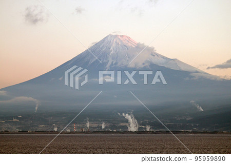 Mt.Fuji bathed in the morning light seen from a cruise ship navigating Suruga Bay Mt.Fuji bathed in the morning light seen from a cruise ship navigating Suruga Bay 95959890