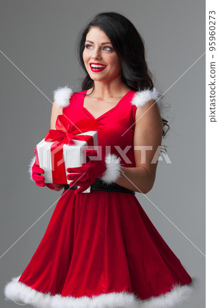 Christmas woman with gift box 95960273