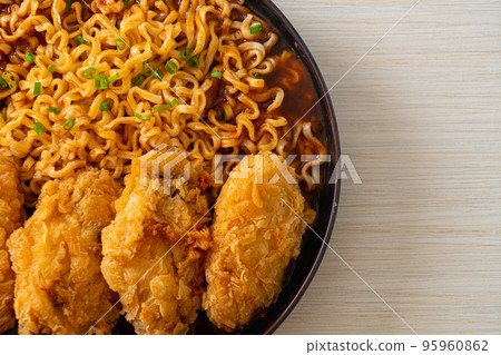 Korean instant noodles with fried chicken or Fried chicken ramyeon 95960862
