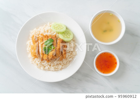 Steamed Rice with Fried Chicken or Hainanese Chicken Rice Steamed Rice with Fried Chicken or Hainanese Chicken Rice 95960912
