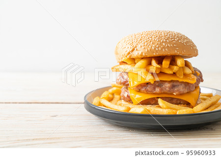 pork burger with cheese and french fries pork burger with cheese and french fries 95960933