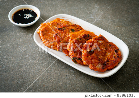 Korean Kimchi pancake or Kimchijeon - Fried Mixed Egg, Kimchi, and Flour 95961033