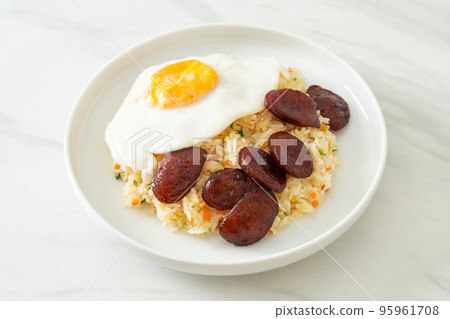 fried rice with fried egg and Chinese sausage 95961708