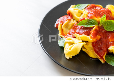 Italian tortellini pasta with tomato sauce Italian tortellini pasta with tomato sauce 95961710