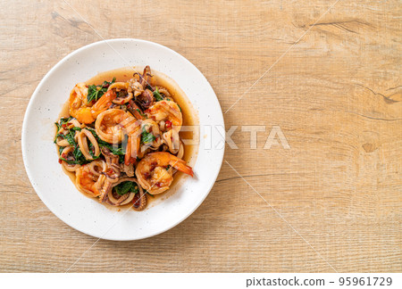 stir-fried seafood with Thai basil stir-fried seafood with Thai basil 95961729