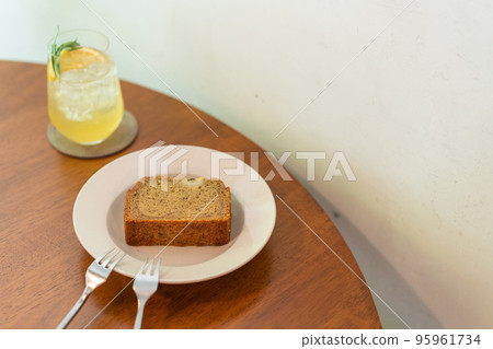 banana cake on plate in cafe restaurant 95961734