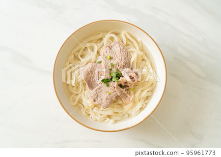 udon noodles with pork in clear soup 95961773