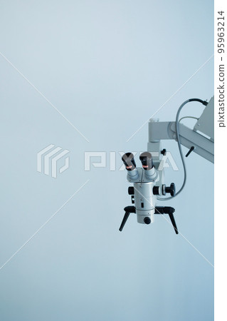 Vertical image of a microscope for dental treatment 95963214