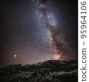 Milky Way and Starry Sky in the Mountains. Milky way galaxy. Long exposure photograph.With grain. 95964106