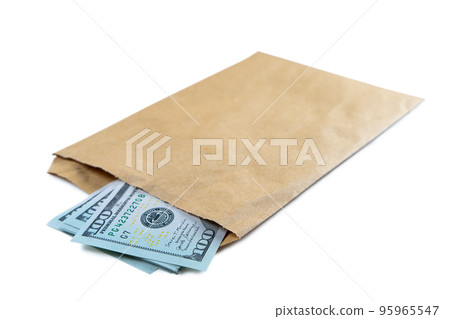 Pile of new design US dollar bills in brown envelope isolated on white background 95965547
