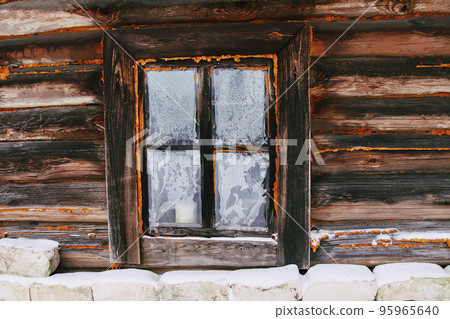 Frozen window pattern. Old rural bathhouse exterior. Frozen window pattern. Old rural bathhouse exterior. 95965640
