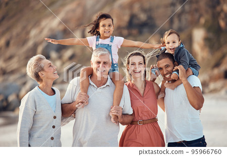 Family beach portrait, child on shoulder and dad, mom and multicultural grandparents together on vacation. Happy big family, generation smile with happiness outdoor in summer holiday for diversity Family beach portrait, child on shoulder and dad, mom and multicultural grandparents together on vacation. Happy big family, generation smile with happiness outdoor in summer holiday for diversity 95966760