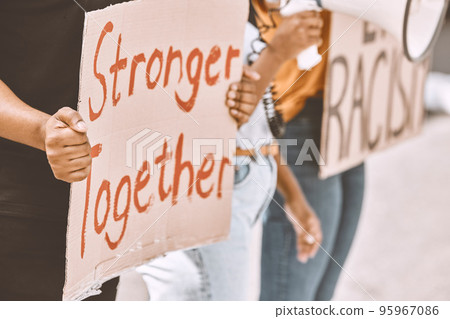 Protest, sign and equality with a group of people holding cardboard during a rally or march for freedom. Street, community and justice with a crowd fighting for human rights or a politics campaign Protest, sign and equality with a group of people holding cardboard during a rally or march for freedom. Street, community and justice with a crowd fighting for human rights or a politics campaign 95967086