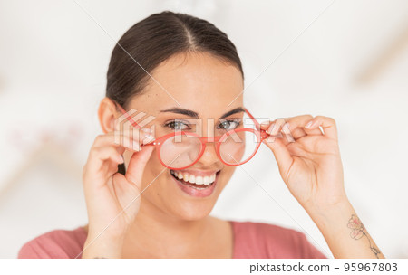 Woman, glasses and portrait of shopping for spectacles in ophthalmology store for health and wellness. Care, retail and young female buying and trying eyewear and eyeglasses while in a optics store 95967803