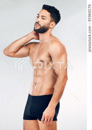 Health, muscle and body of underwear model with healthy lifestyle, wellness and self care fitness for body care goals. Training exercise, workout and aesthetic man with strong abs, stomach or abdomen Health, muscle and body of underwear model with healthy lifestyle, wellness and self care fitness for body care goals. Training exercise, workout and aesthetic man with strong abs, stomach or abdomen 95968576