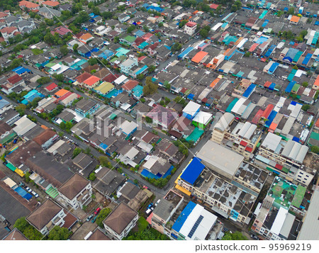 Aerial view of residential neighborhood roofs. Urban housing development from above. Top view. Real estate in Bangkok City, Thailand. Property real estate. 95969219